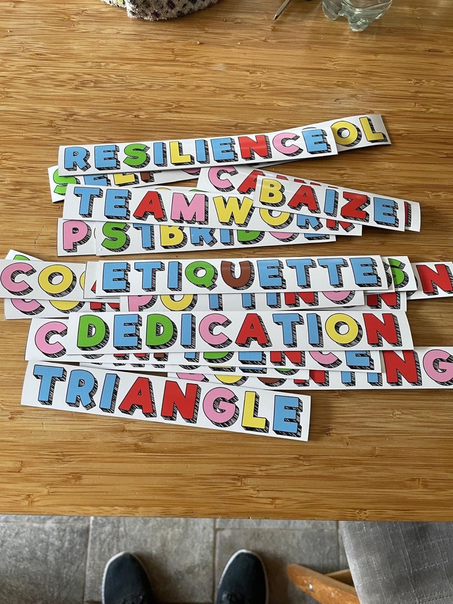 ACE word cards: resilience, teamwork, etiquette, dedication, triangle