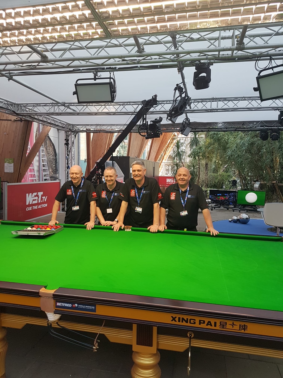 Paul and fellow coaches at a World Snooker Tour table