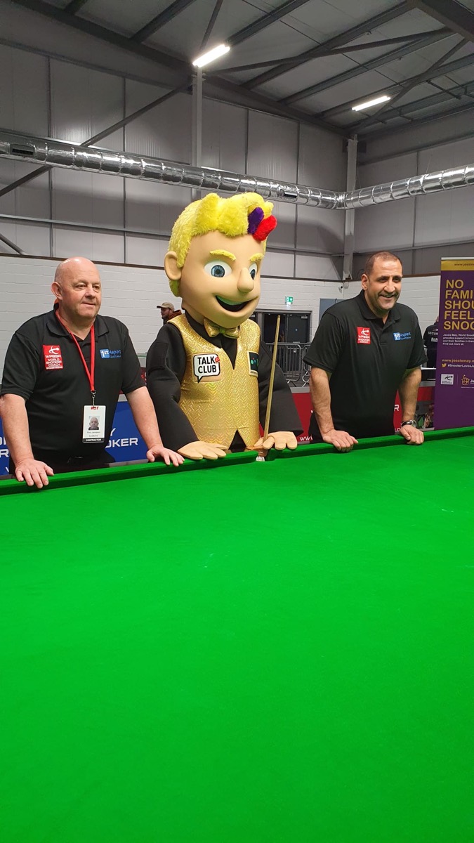 Paul and Johnny Potalot at a tournament snooker table